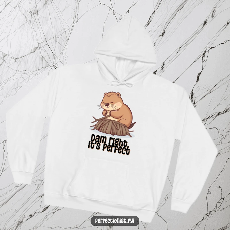 Funny hoodie showcasing a beaver obsessively smoothing every dam twig to identical lengths, exuding a comical sense of perfectionism and dedication.